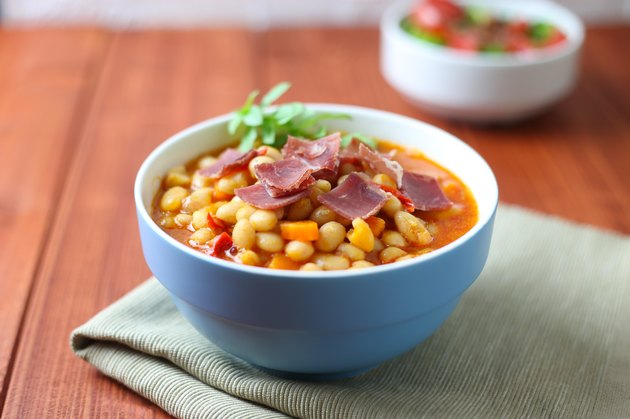 Bean soup with bacon and salad