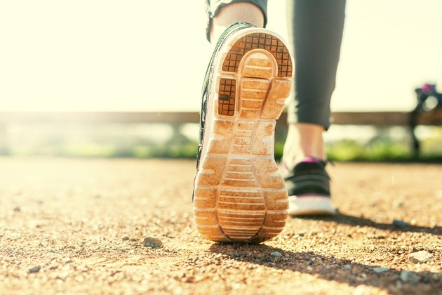 Sports Woman's legs in running movement