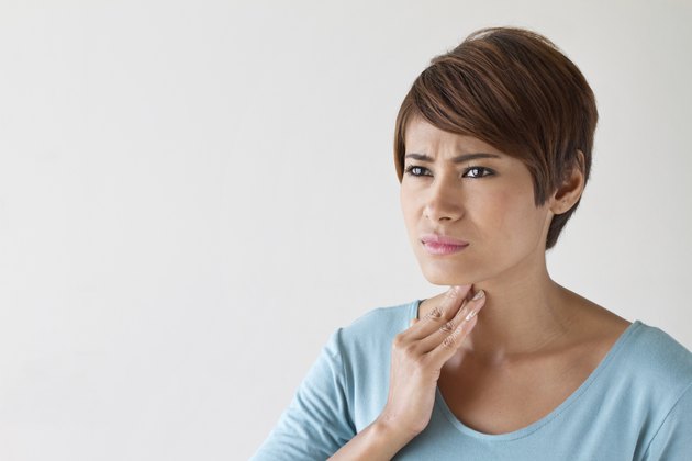 sick woman with sore throat, inflammation