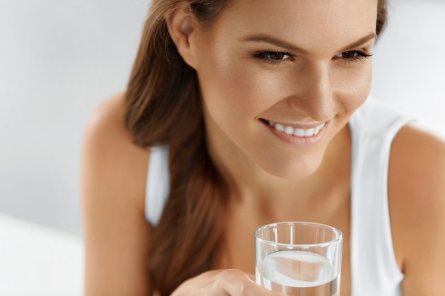 Health, Beauty, Diet Concept. Woman Drinking Water. Drink. Water