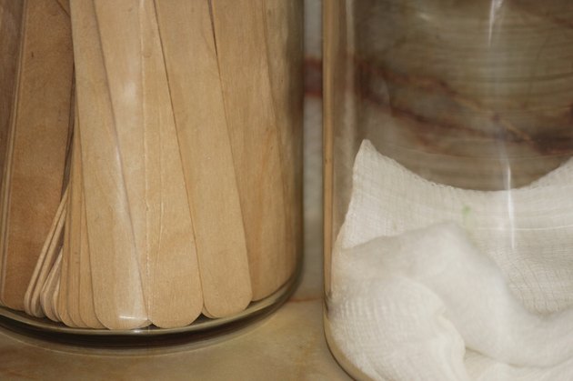 Tongue depressor and gauze