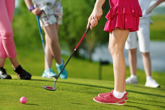 Kids playing golf