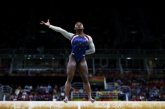 RIO DE JANEIRO, BRAZIL - AUGUST 11: Simone Biles of the United States competes on the balance beam during the Women’s Individual All Around Final on Day 6 of the 2016 Rio Olympics at Rio Olympic Arena on August 11, 2016, in Rio de Janeiro, Brazil. (Photo by Elsa/Getty Images)