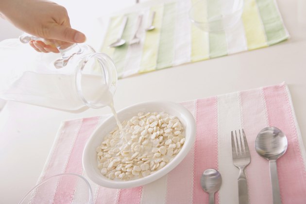 Pouring Milk To Cereal
