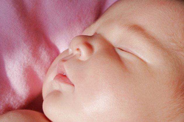 The face of a sleeping baby