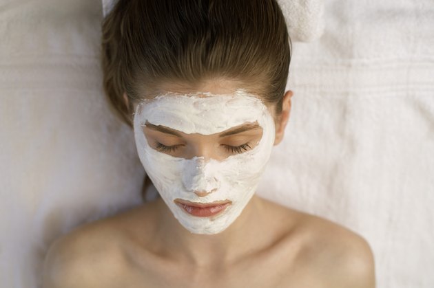 Woman wearing white facial mask