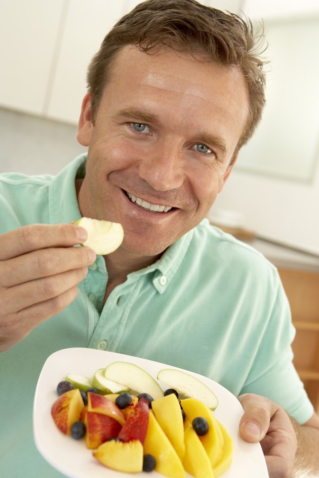 Man eating fresh fruit