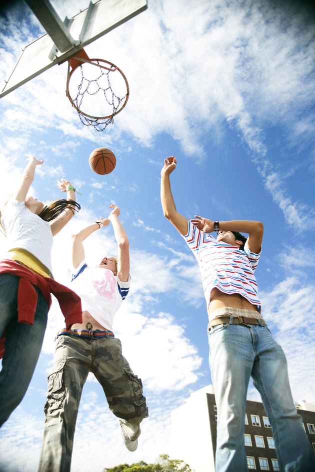 Young people playing basketball