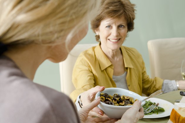Women passing food