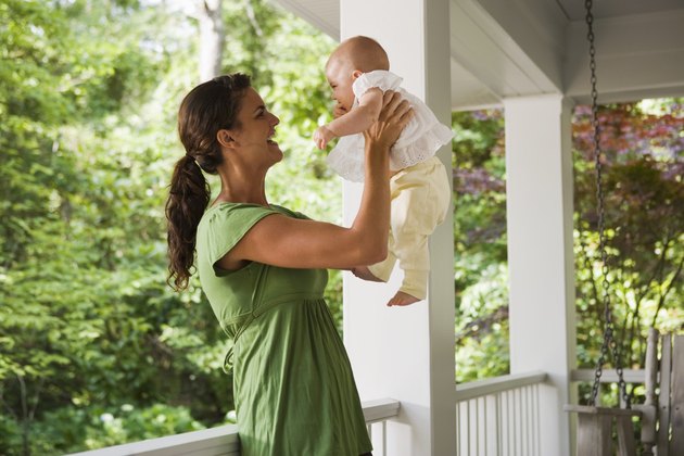 Happy mother with baby