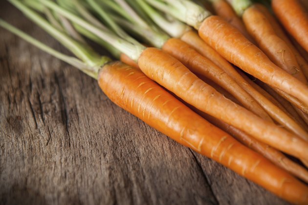 carrots on a wooden background