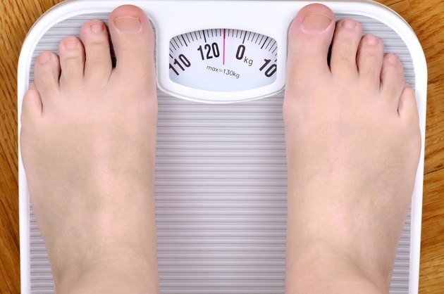 Barefoot person on the scale