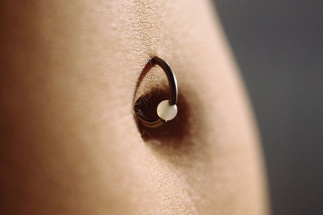 Belly button ring, close-up