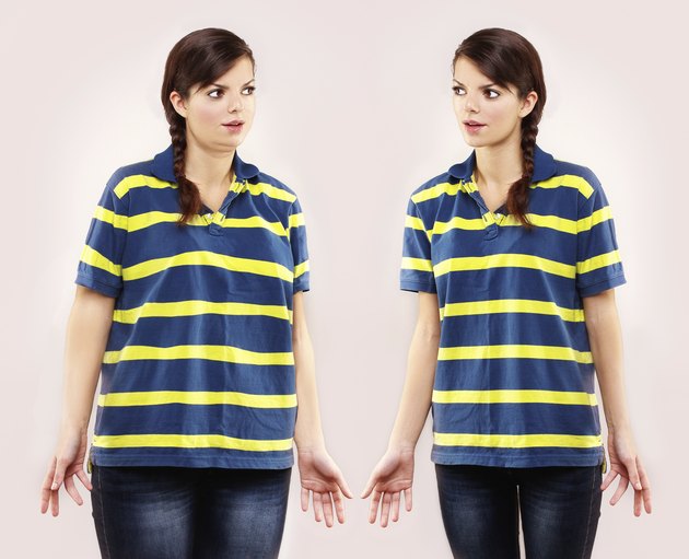 Fat girl standing in front of thin one