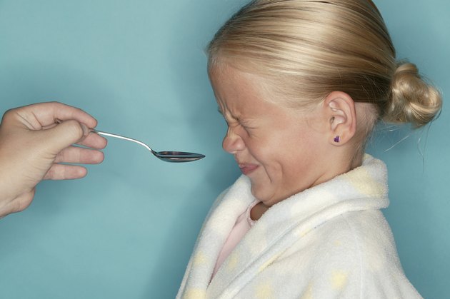 Girl taking medicine