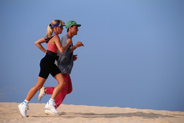 Young men and women jogging