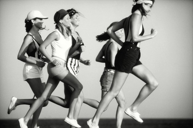 Women jogging, side view