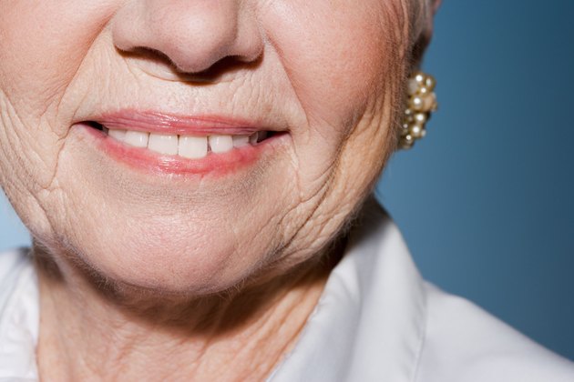 Senior woman wearing earrings