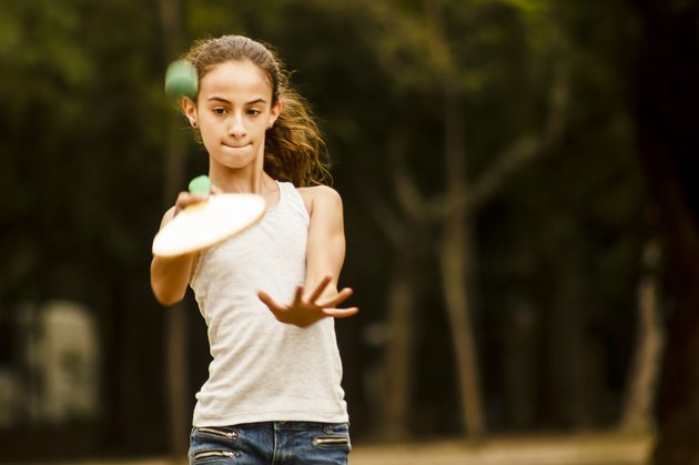 Pretty Girl Playing Matkot on Park in Rio de Janeiro