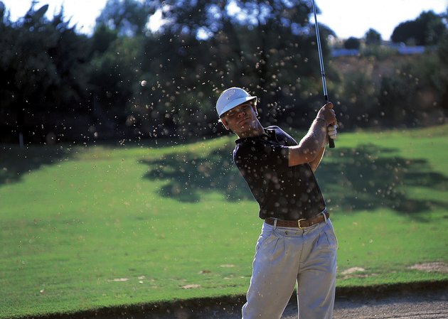portrait of a golfer after striking a shot