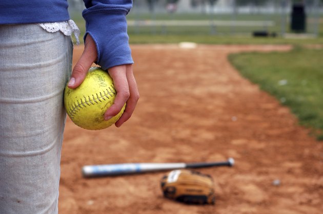 Teenage Girl and Her Softball, Glove, Bat