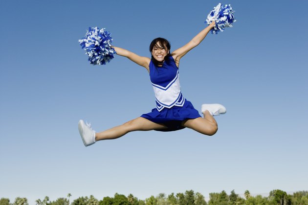 Jumping Cheerleader Performing Cheer in Mid-Air