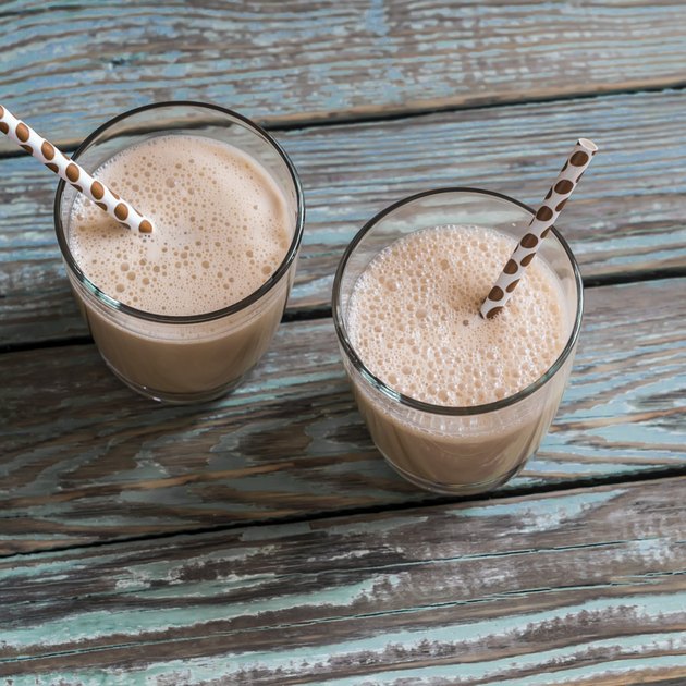 Dulce di leche and ice cream milkshake in glasses