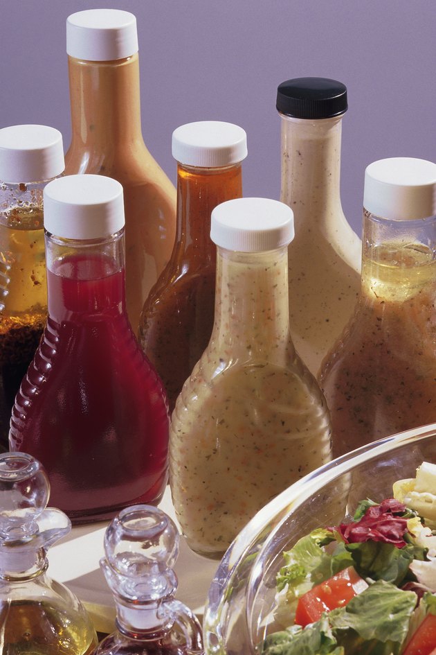 Salad with assorted bottles of dressing