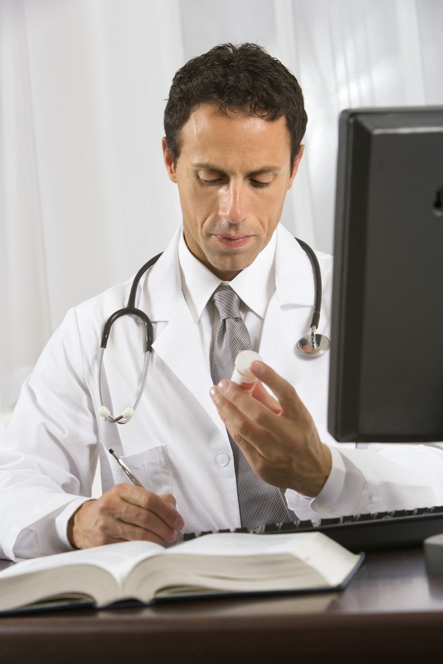Doctor writing prescription