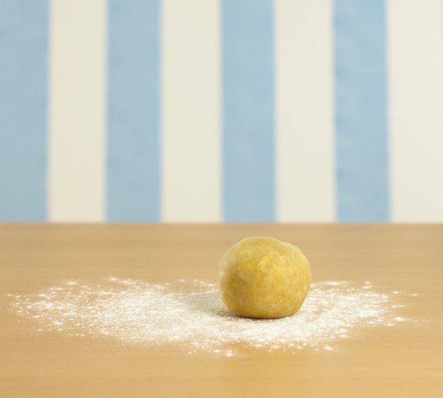 Ball of dough on flour