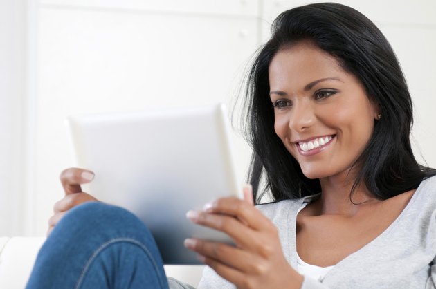Girl enjoy modern tablet