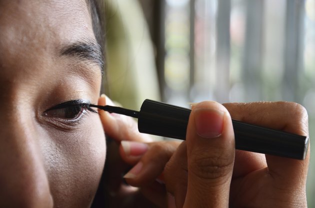 how to remove black eyeliner from clothes