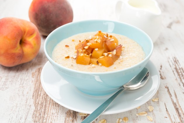 oatmeal with caramelized peaches in a bowl and yogurt