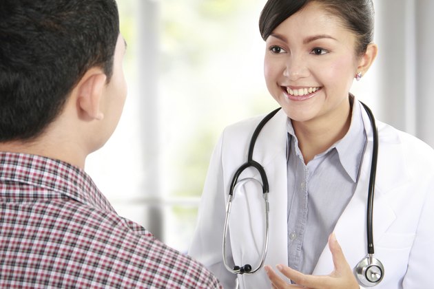 female doctor listening to her patient