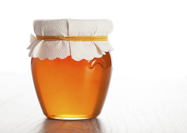 Glass jar with honey