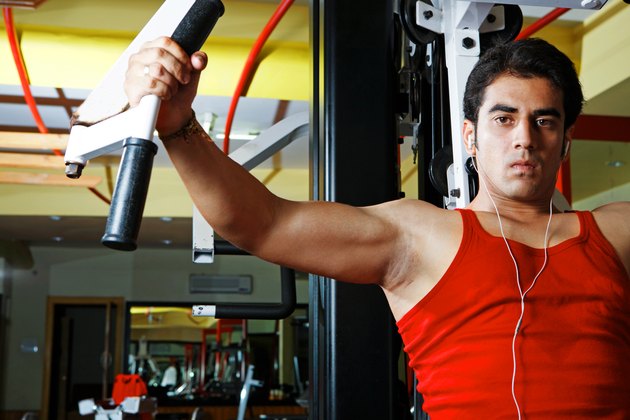 Man Using Exercise Machine