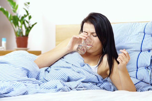 young woman feels thirsty in the morning
