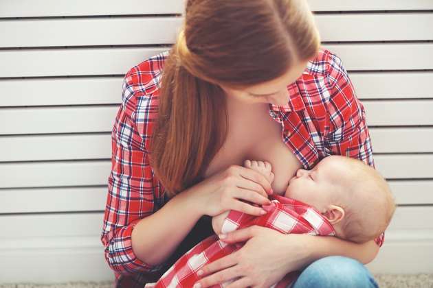 breastfeeding. mother breast feeding baby