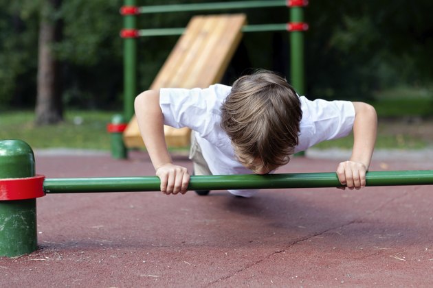 Boy playing sports outdoors