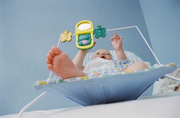 Baby playing with toy