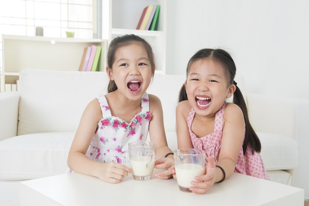 Children drinking milk.