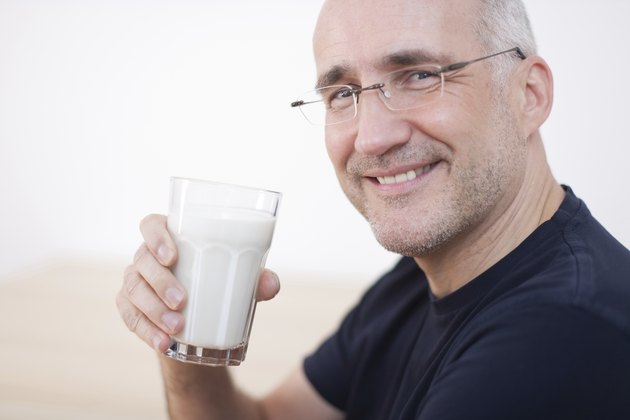 Mature Man Drinking Milk