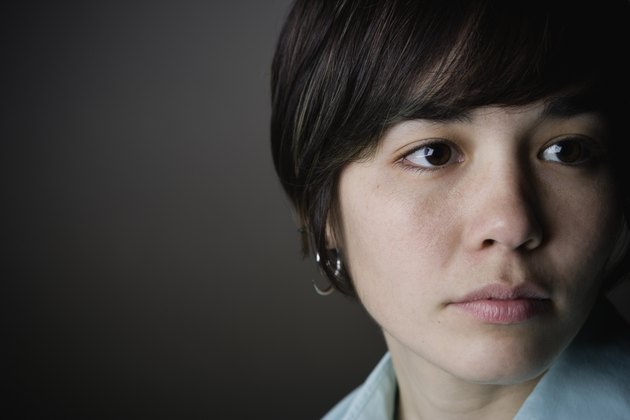 Close up of young woman looking to the side