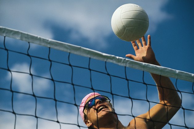 Man playing beach volleyball