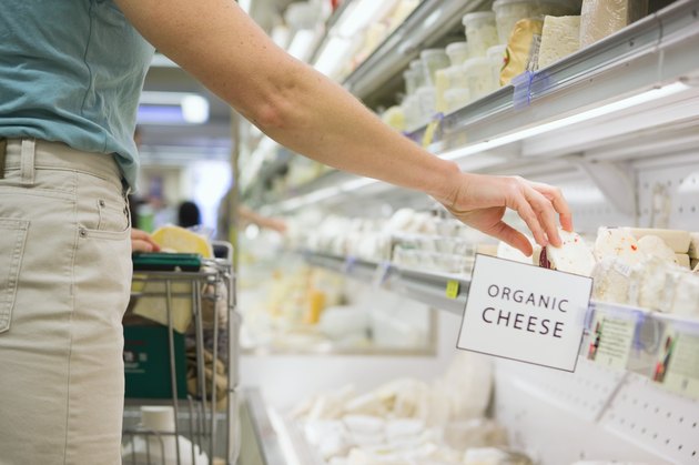 Person shopping for organic cheese