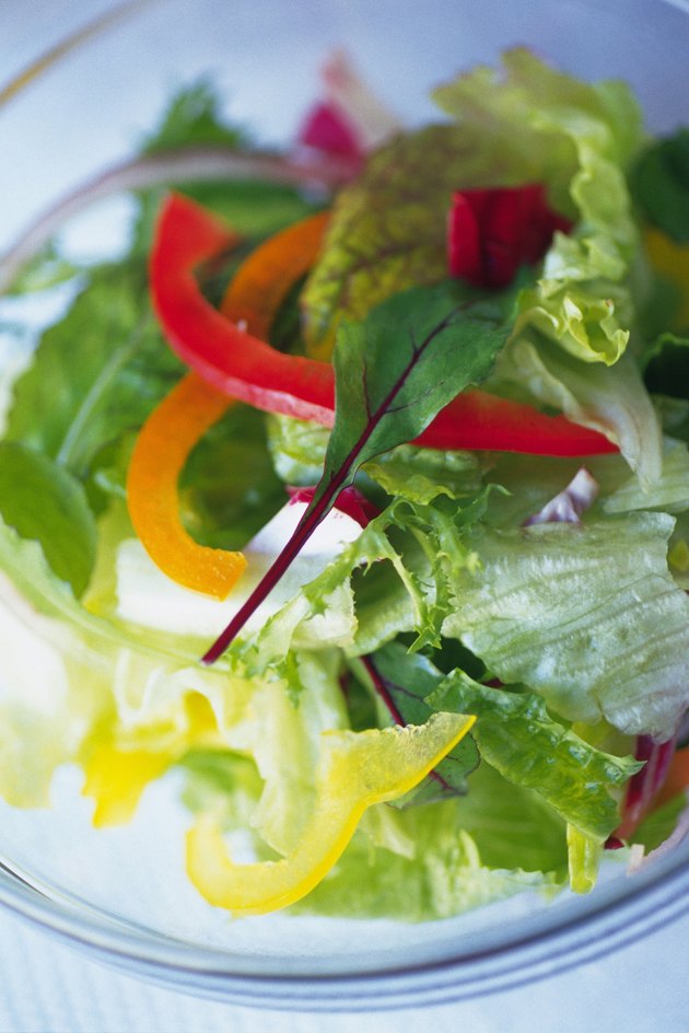 Mixed salad leaves in bowl, Differential Focus, Close Up