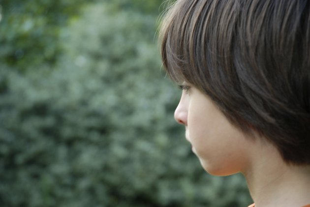 Profile of a dark haired boy