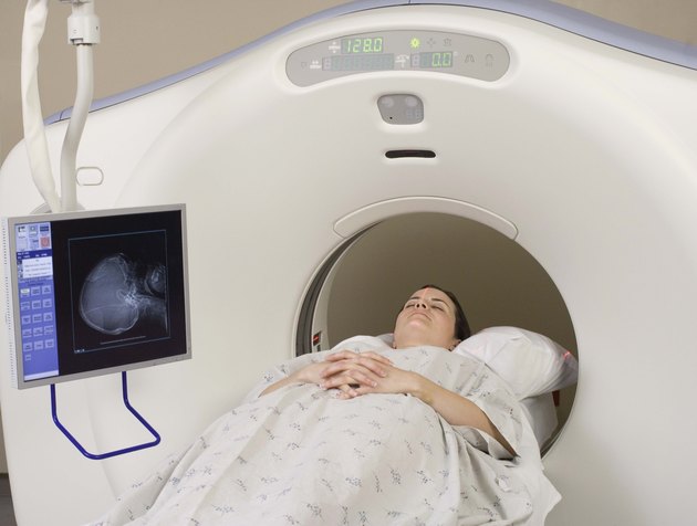 Patient lying down on MRI scanner