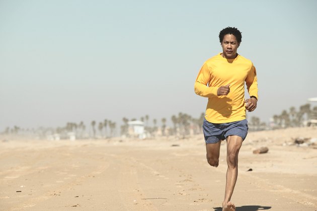 Man running on beach