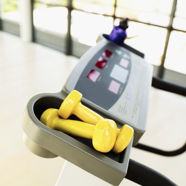 Close-up of dumbbells lying on an exercise machine